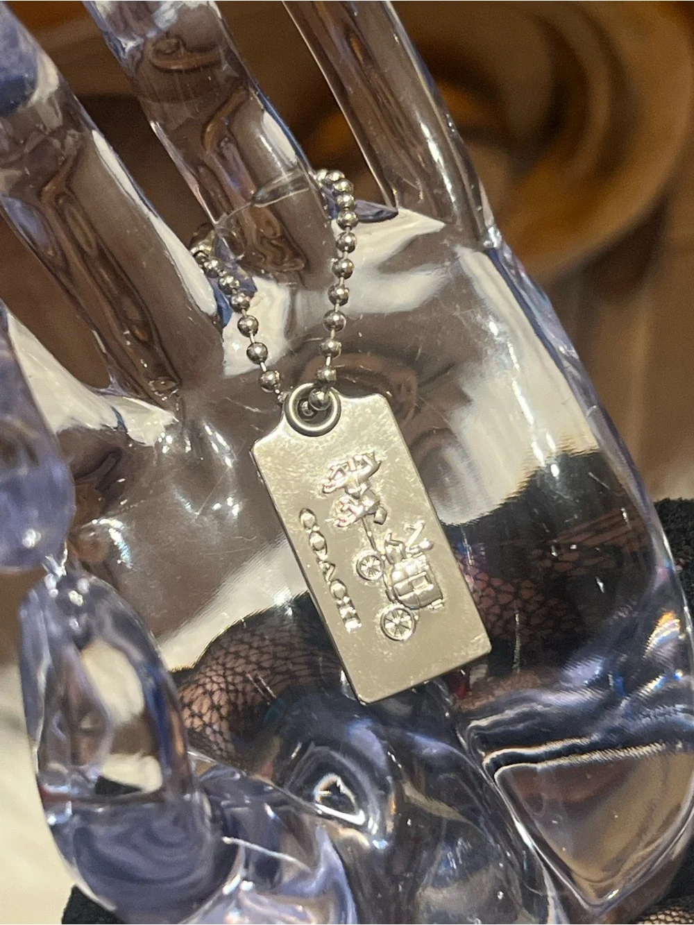 Coach Silver Tone Embossed Horse & Carriage Dog Tag Keychain